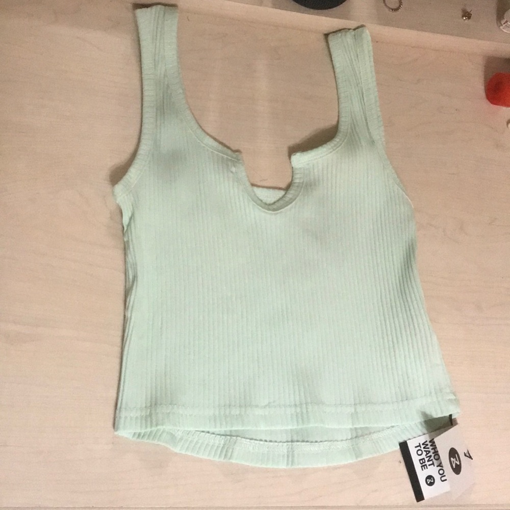 light bluish teal workout tank top